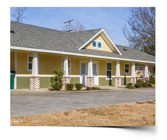 Designed to accommodate multiple tenants per unit, these duplexes fit nicely in the neighborhood with spacious porches, peaceful colors, and relaxed floor plans for multiple options of living styles.